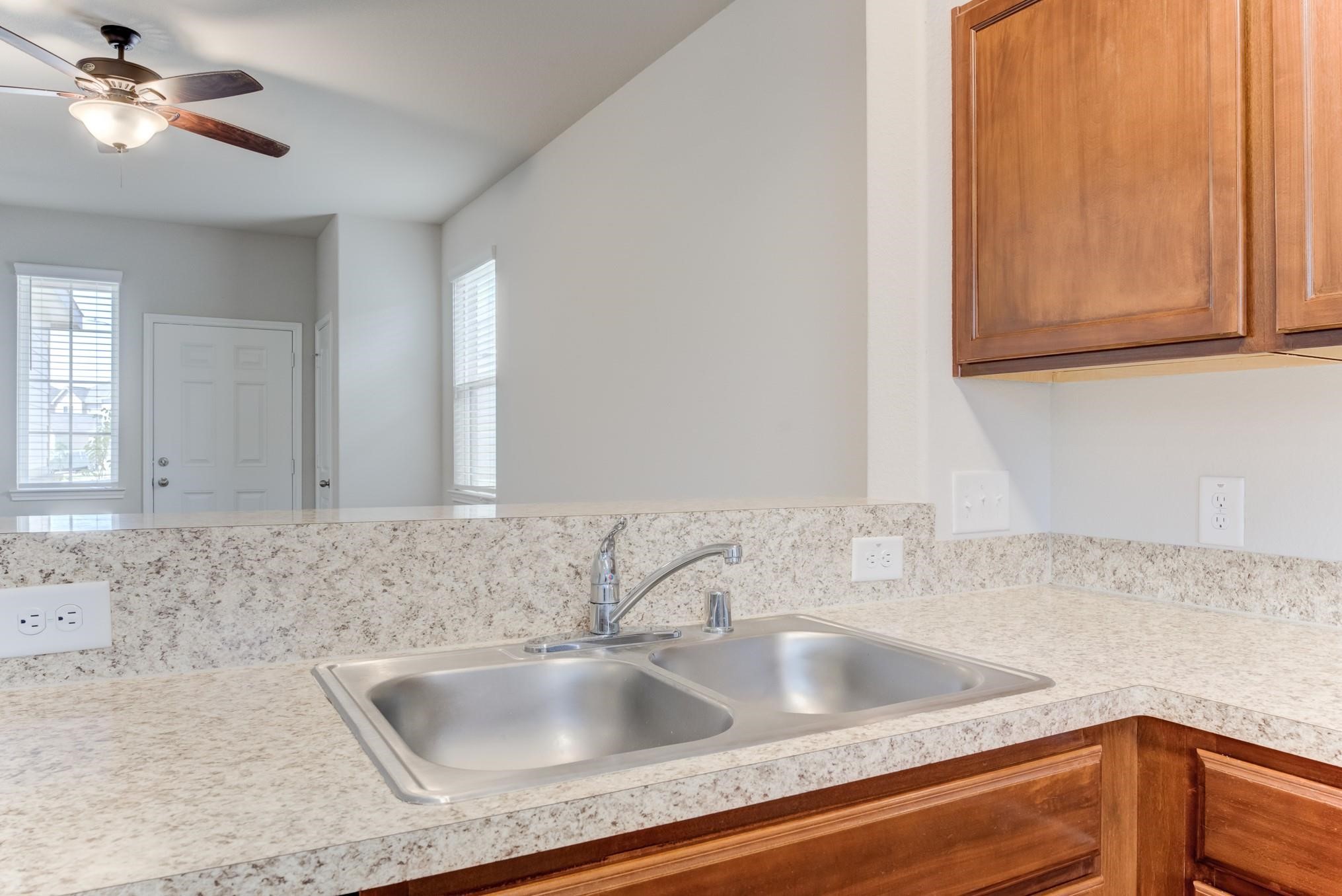 5842 Adelaide River Drive Katy, TX 77449 - Photo 14 of 40 a close view of sink and tap