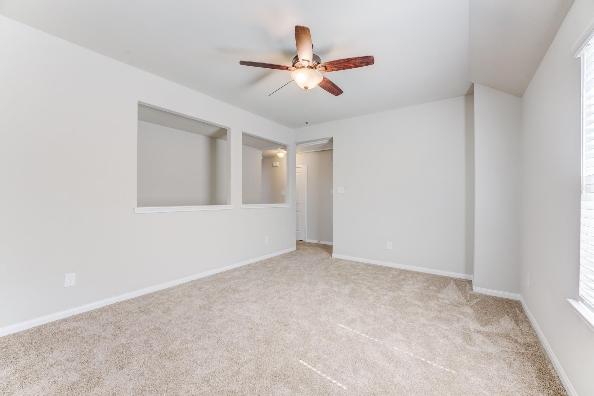 5842 Adelaide River Drive Katy, TX 77449 - Photo 25 of 40 a view of an empty room