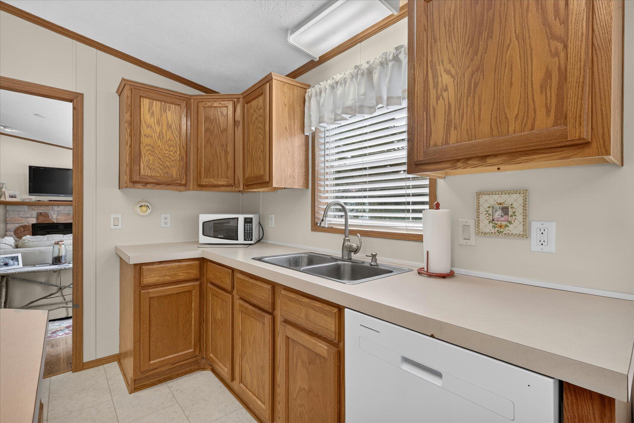 8000 Warren Woods Road, Unit 100 Three Oaks, MI 49128 - Photo 11 of 34 11-8000-Warren-Woods-Rd-100-WindowStill-
