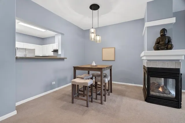 a view of a livingroom with furniture and a fireplace