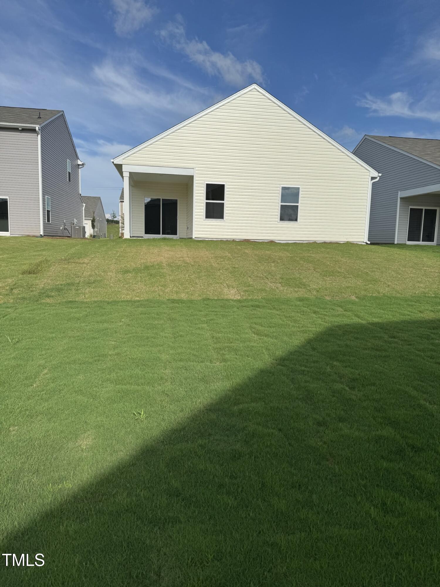 156 Gladstone Loop Clayton, NC 27520 - Photo 2 of 21 glimmer rear