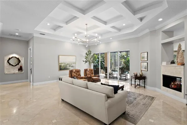 a kitchen with stainless steel appliances granite countertop a sink a stove and a refrigerator
