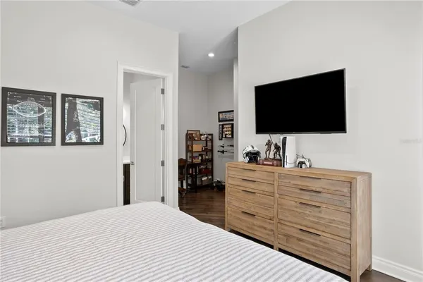 a view of a livingroom with furniture and a flat screen tv