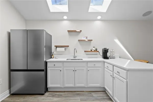 a backyard of a house with lots of green space