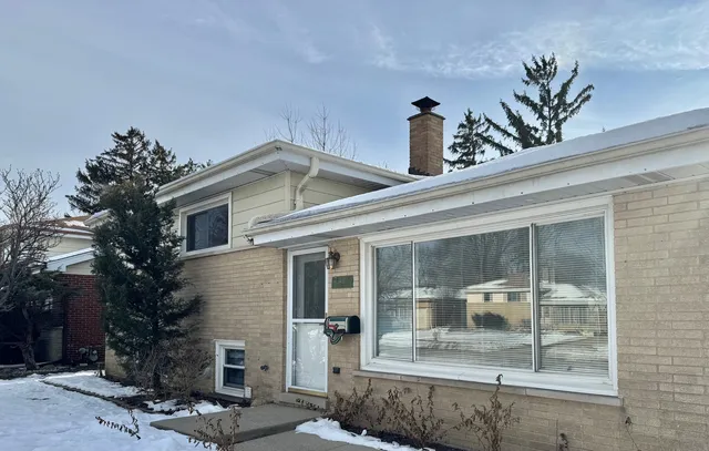 a front view of a house with a porch