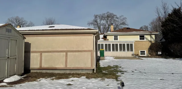 a kitchen with stainless steel appliances granite countertop a refrigerator and a stove