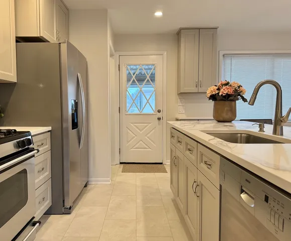 a closeup of a sink and a mirror