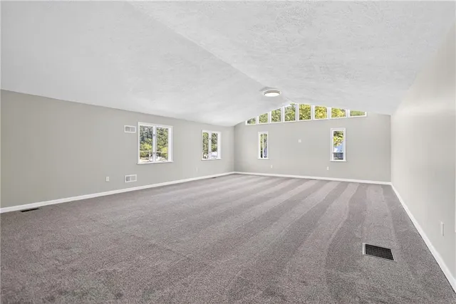a view of a kitchen with a sink and cabinets