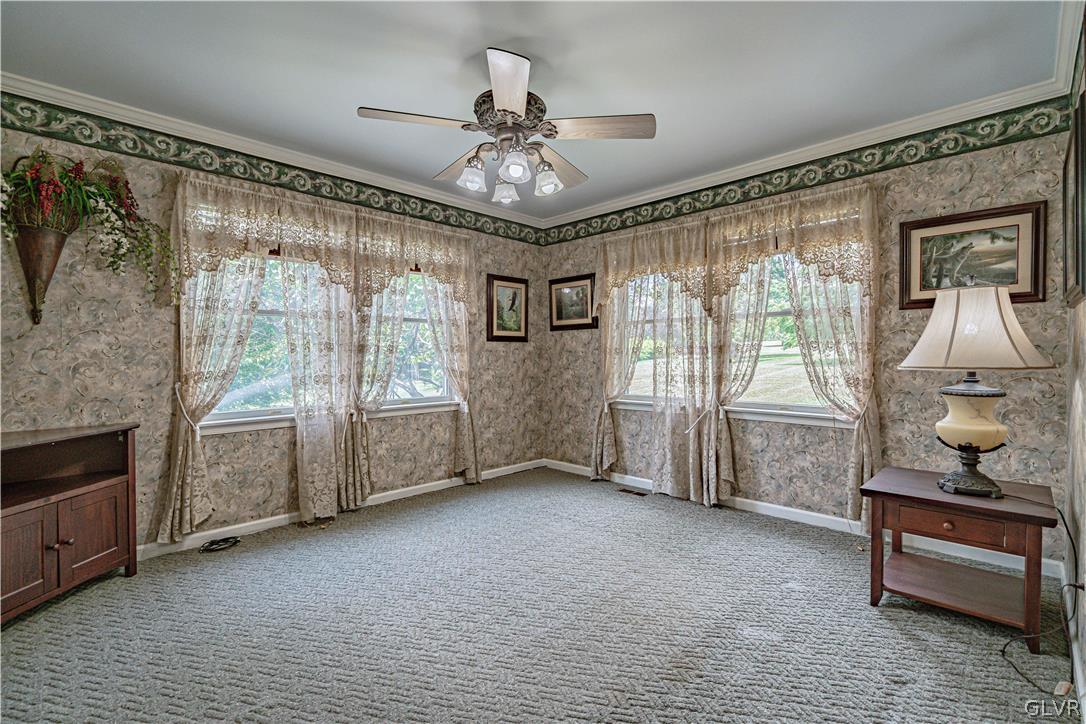 694 Bok Road Nazareth, PA 18064 - Photo 16 of 44 a view of a livingroom with furniture and a ceiling fan