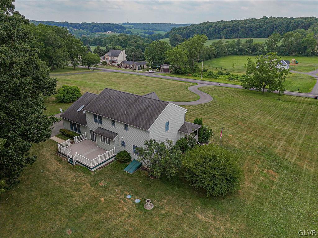 694 Bok Road Nazareth, PA 18064 - Photo 3 of 44 a view of a lake with a yard
