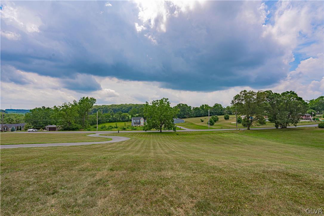 694 Bok Road Nazareth, PA 18064 - Photo 42 of 44 a view of a green field with an trees in the background