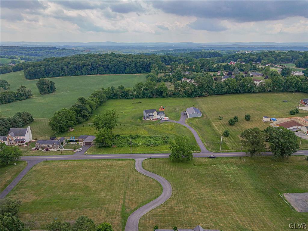 694 Bok Road Nazareth, PA 18064 - Photo 43 of 44 an aerial view of a house with a garden and lake view