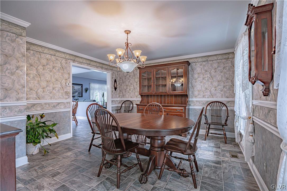 694 Bok Road Nazareth, PA 18064 - Photo 9 of 44 a dining room with furniture potted plants and wooden floor