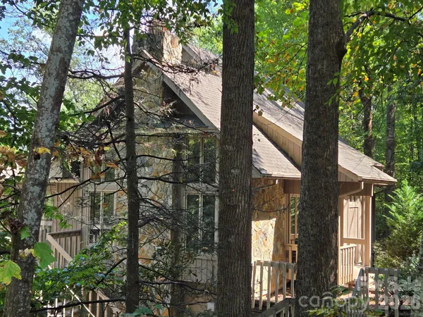 a view of balcony with furniture and wooden deck