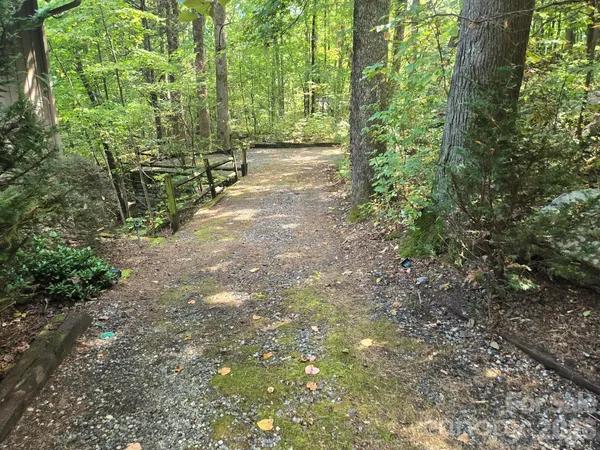 a room with pool table and windows