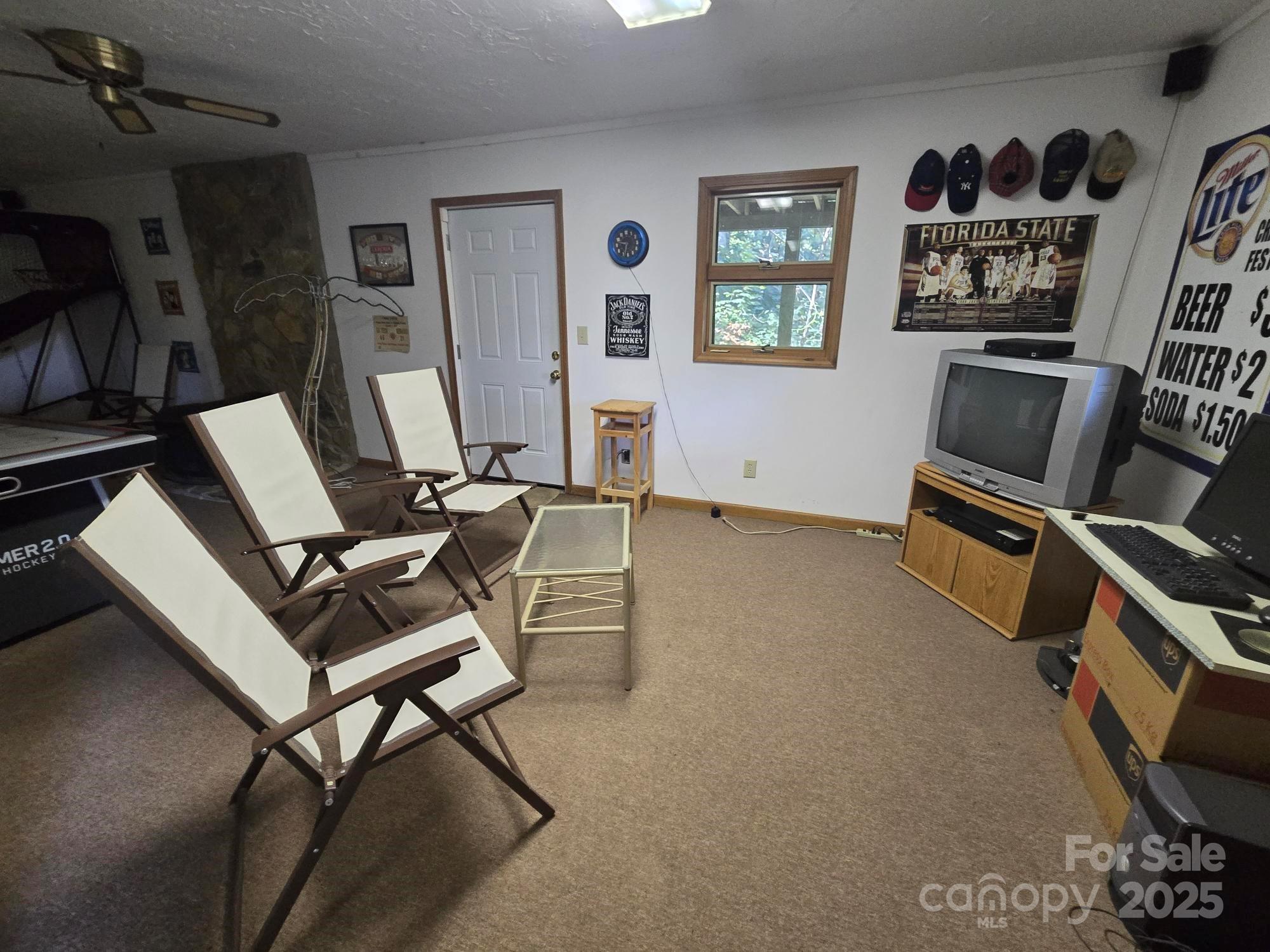 352 Bolt Road Lake Lure, NC 28746 - Photo 20 of 31 a view of a workspace with furniture and a window