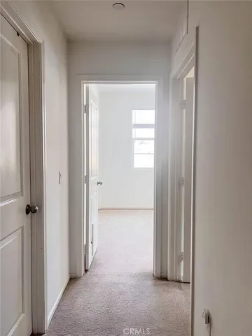 a view of a room that has a window in it