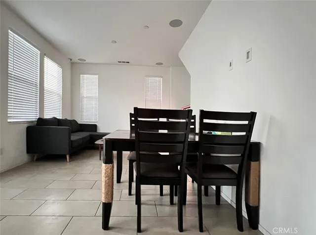 a view of a workspace with furniture