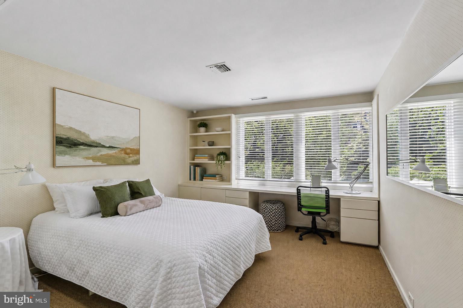 1673 Paper Mill Road Jenkintown, PA 19046 - Photo 43 of 73 a bedroom with a large bed and a large window