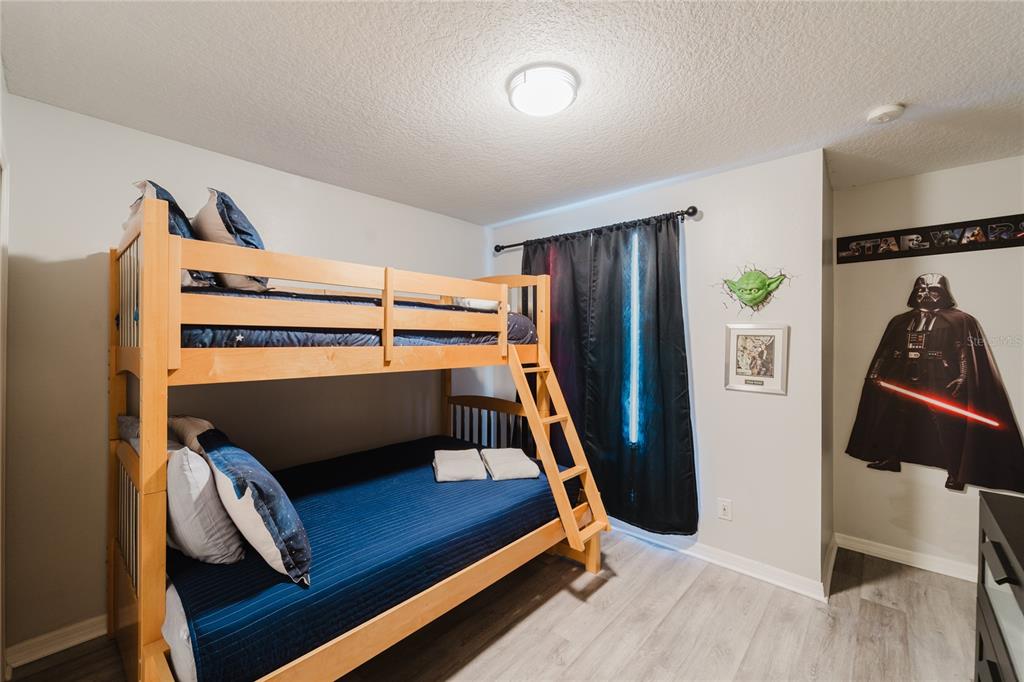 8961 Majesty Palm Road Kissimmee, FL 34747 - Photo 26 of 40 a bedroom with bunk bed