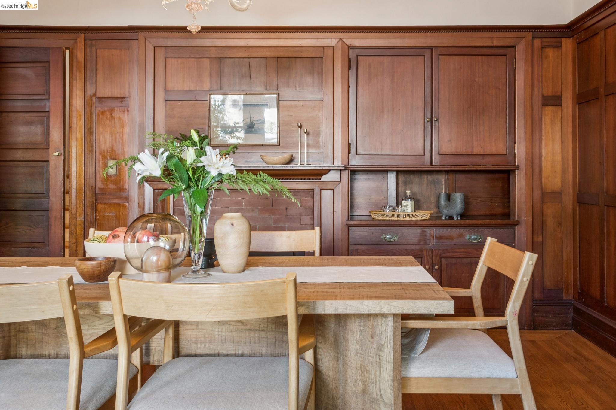 1490 Arch Street Berkeley, CA 94708 - Photo 15 of 57 a dining room with furniture and a potted plant
