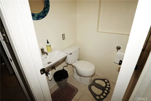 a bathroom with a toilet and a sink
