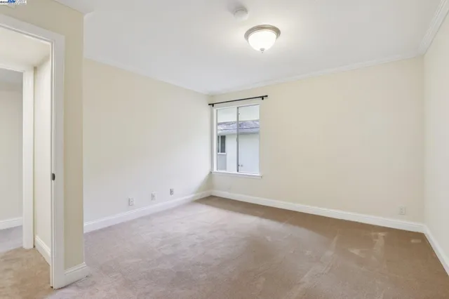 an empty room with a natural light