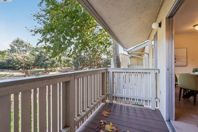 a view of a wooden balcony and wooden floor