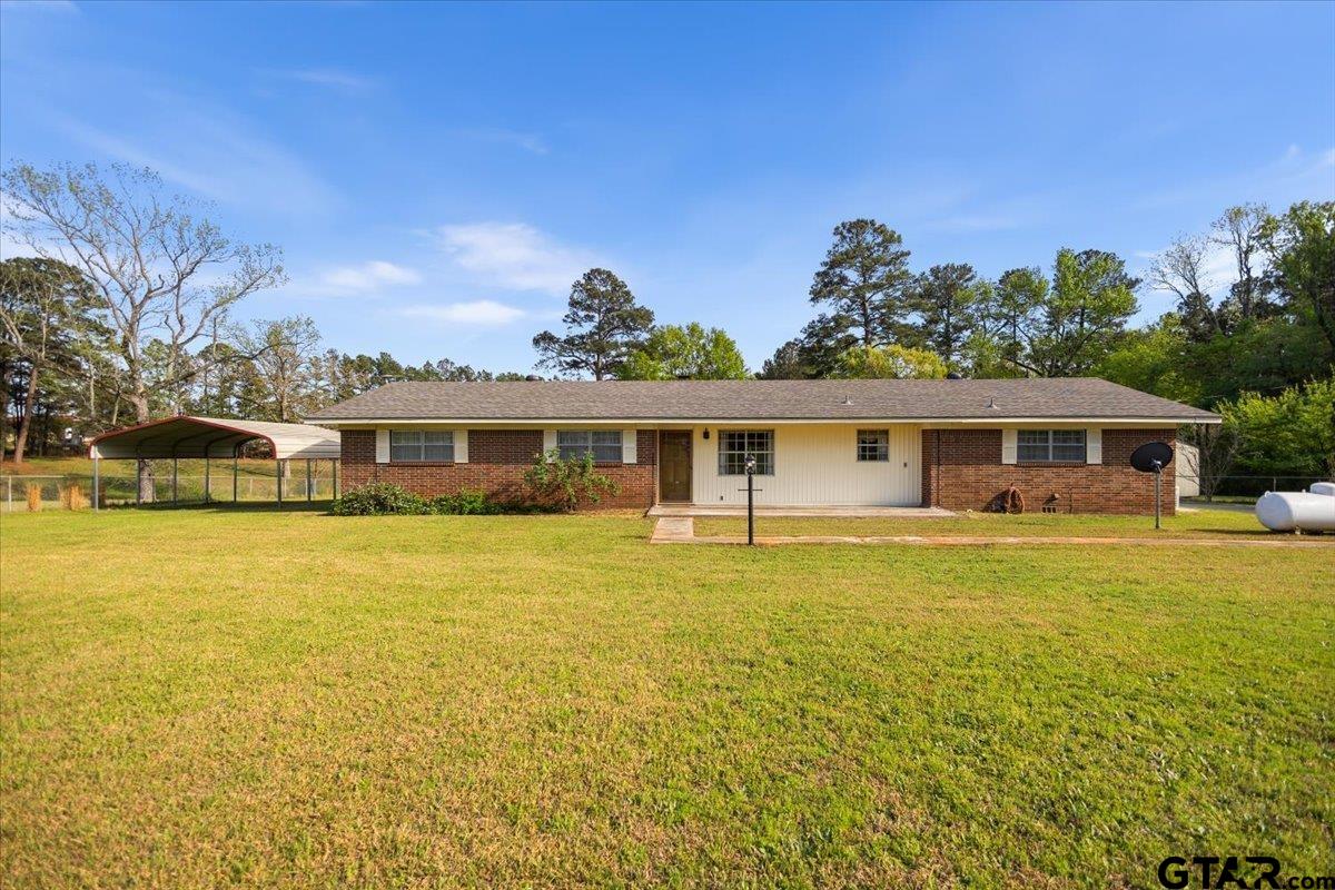5357 Farm To Market Road 2087 Longview, TX 75603 - Photo 1 of 39 a front view of a house with a big yard