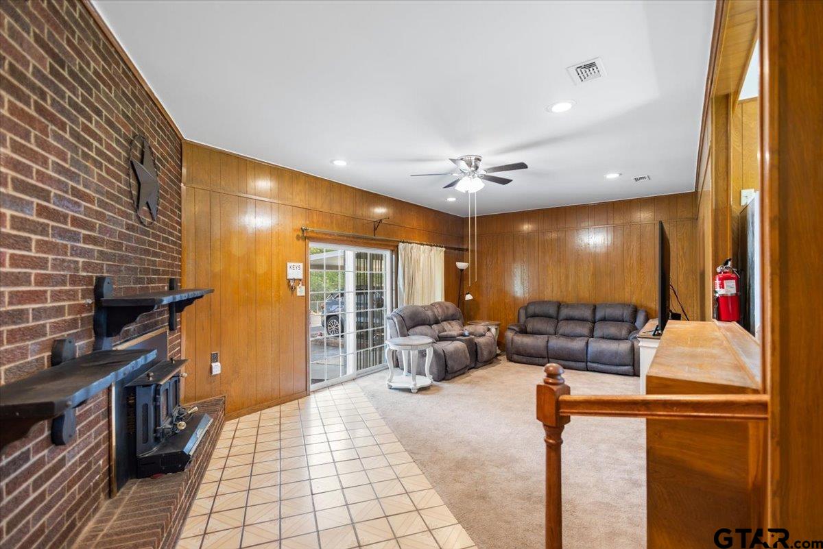 5357 Farm To Market Road 2087 Longview, TX 75603 - Photo 20 of 39 a living room with furniture and a flat screen tv