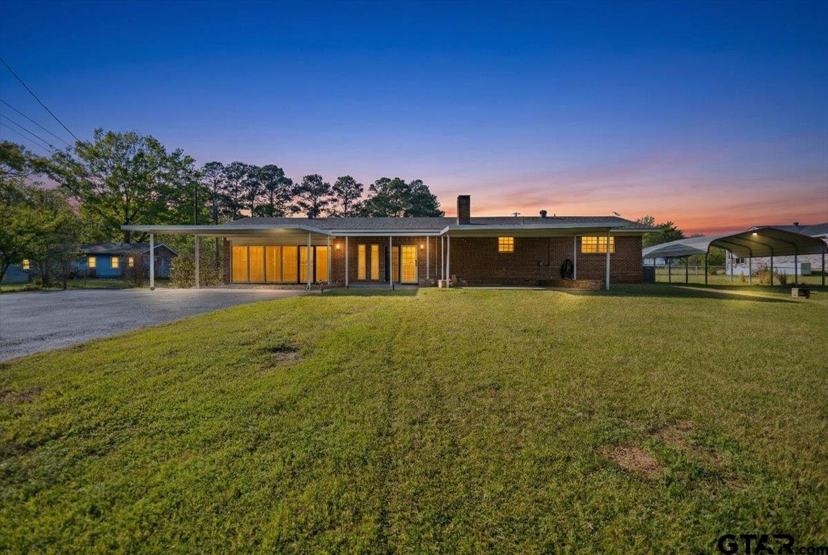 5357 Farm To Market Road 2087 Longview, TX 75603 - Photo 3 of 39 a view of a house with a yard