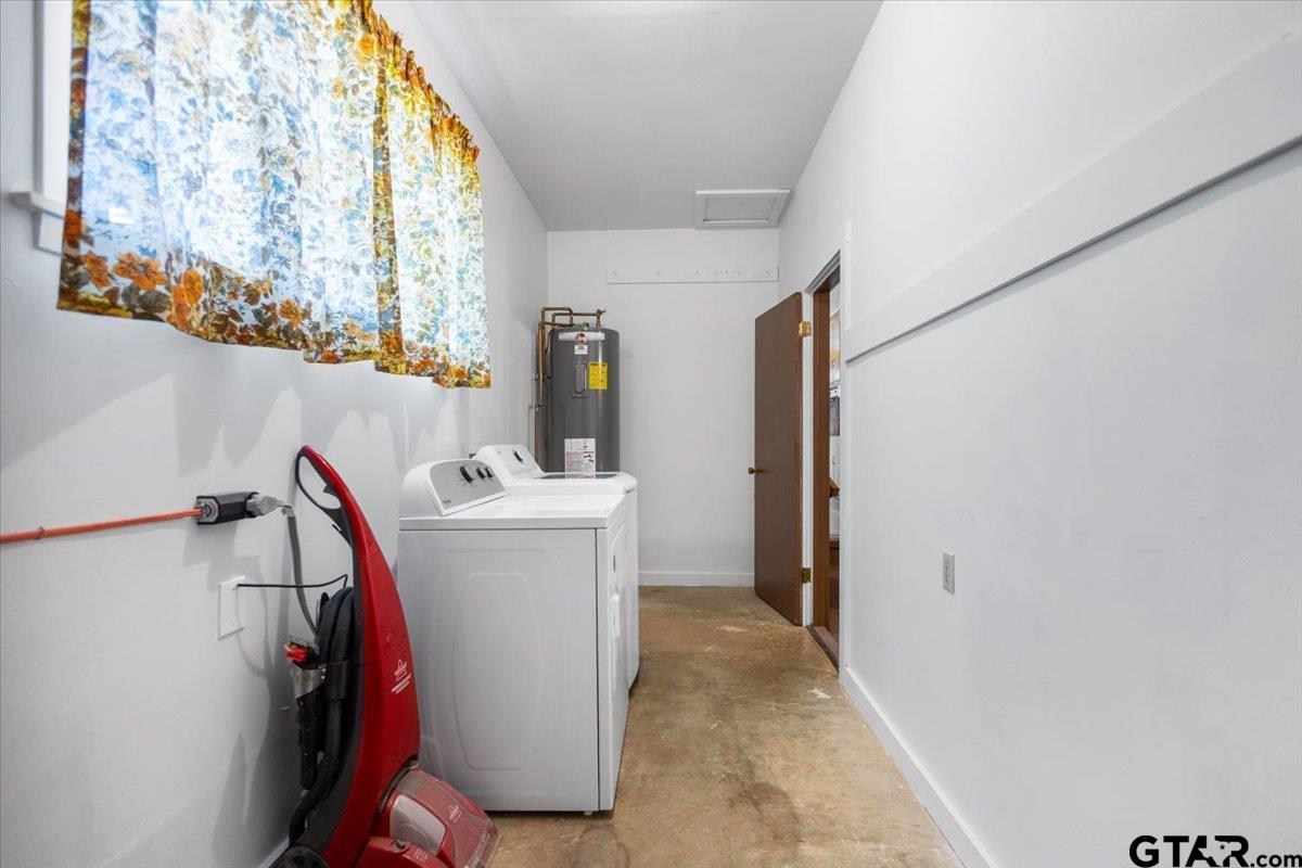 5357 Farm To Market Road 2087 Longview, TX 75603 - Photo 31 of 39 a utility room with dryer and washer