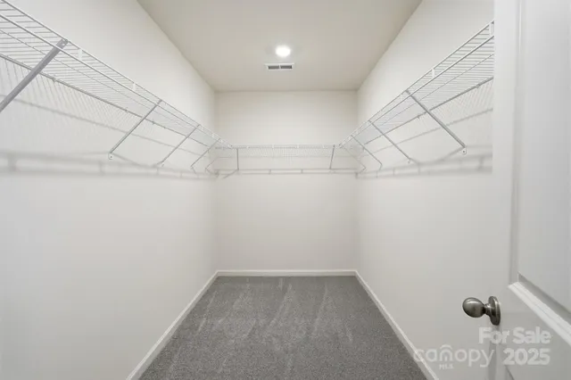 a view of a room with racks on the wall
