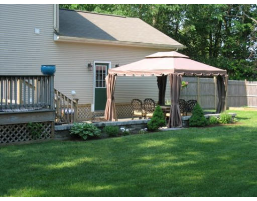 16 Country Hill Road Cumberland, RI 02864 - Photo 11 of 16 a view of a house with a garden