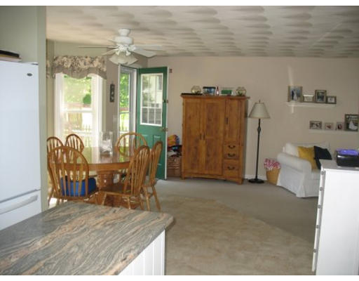 16 Country Hill Road Cumberland, RI 02864 - Photo 15 of 16 a dining room with furniture and large windows
