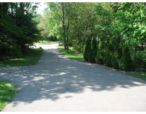 16 Country Hill Road Cumberland, RI 02864 - Photo 2 of 16 a view of a yard with a tree