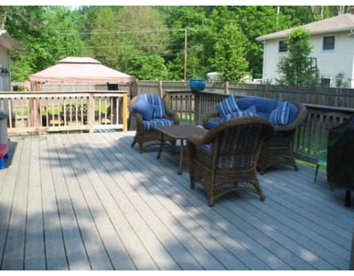 16 Country Hill Road Cumberland, RI 02864 - Photo 10 of 16 a view of backyard with outdoor seating and wooden floor
