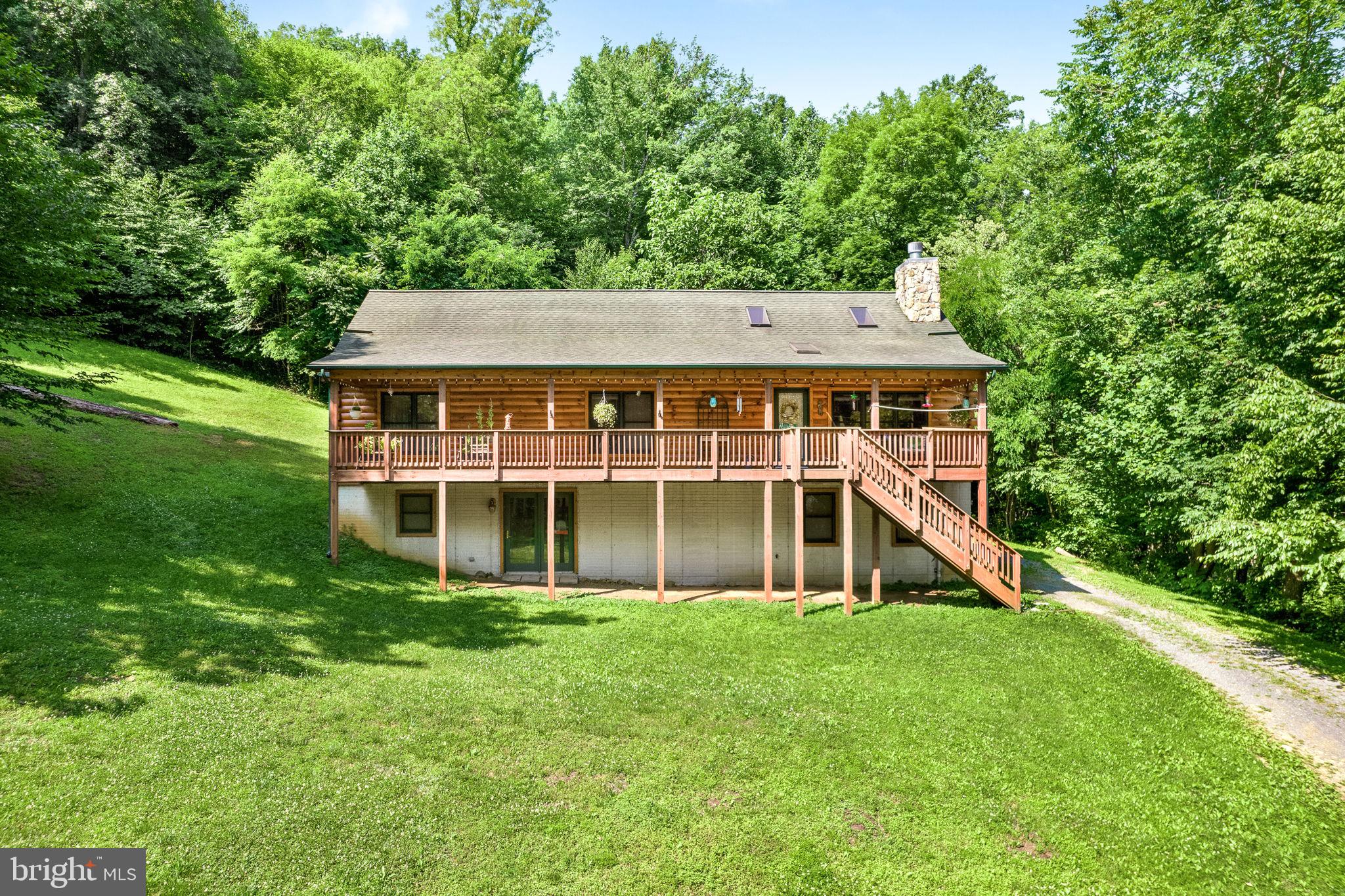 938 Fetchett Road Bentonville, VA 22610 - Photo 1 of 29 Beautiful log home in a private country setting