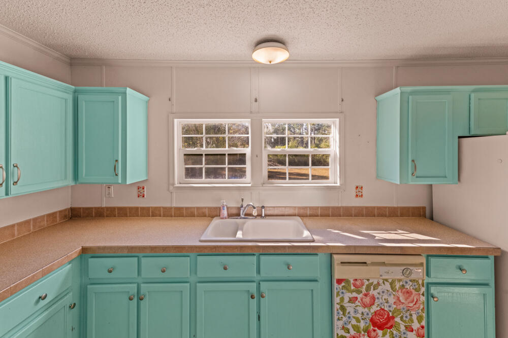 5710 US 90 Lee, FL 32059 - Photo 15 of 38 a room with a sink and a window