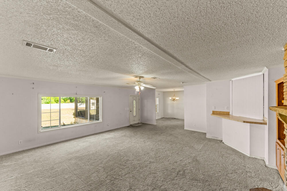 5710 US 90 Lee, FL 32059 - Photo 8 of 38 a view of an empty room with a window