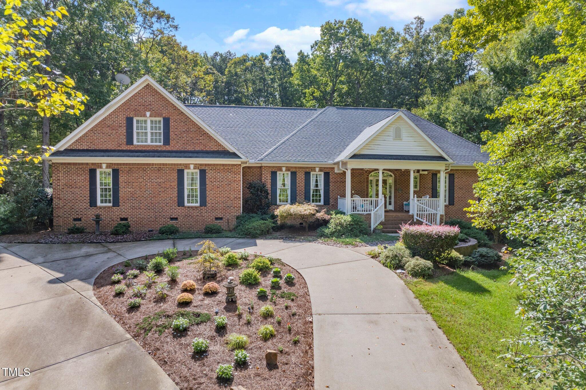 10937 Cahill Road Raleigh, NC 27614 - Photo 1 of 53 All Brick Home on 1.43 Acres of Peace and Tranquility - Custom Built w/Attention to Detail