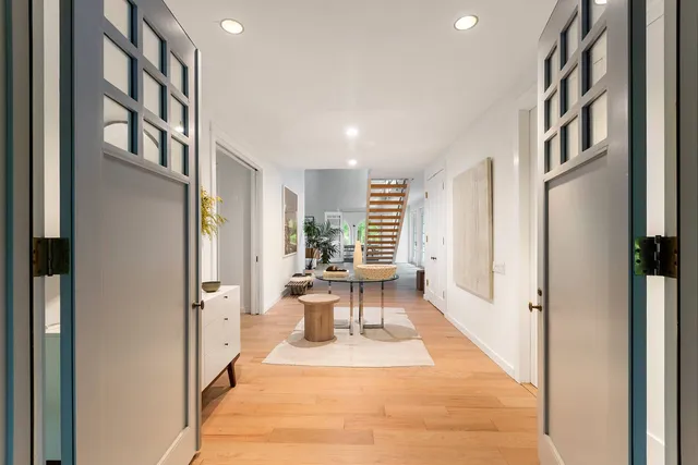 a view of a hallway with windows