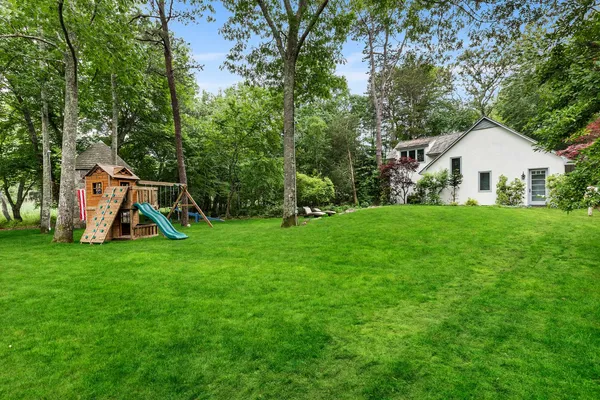 a view of a house with a park