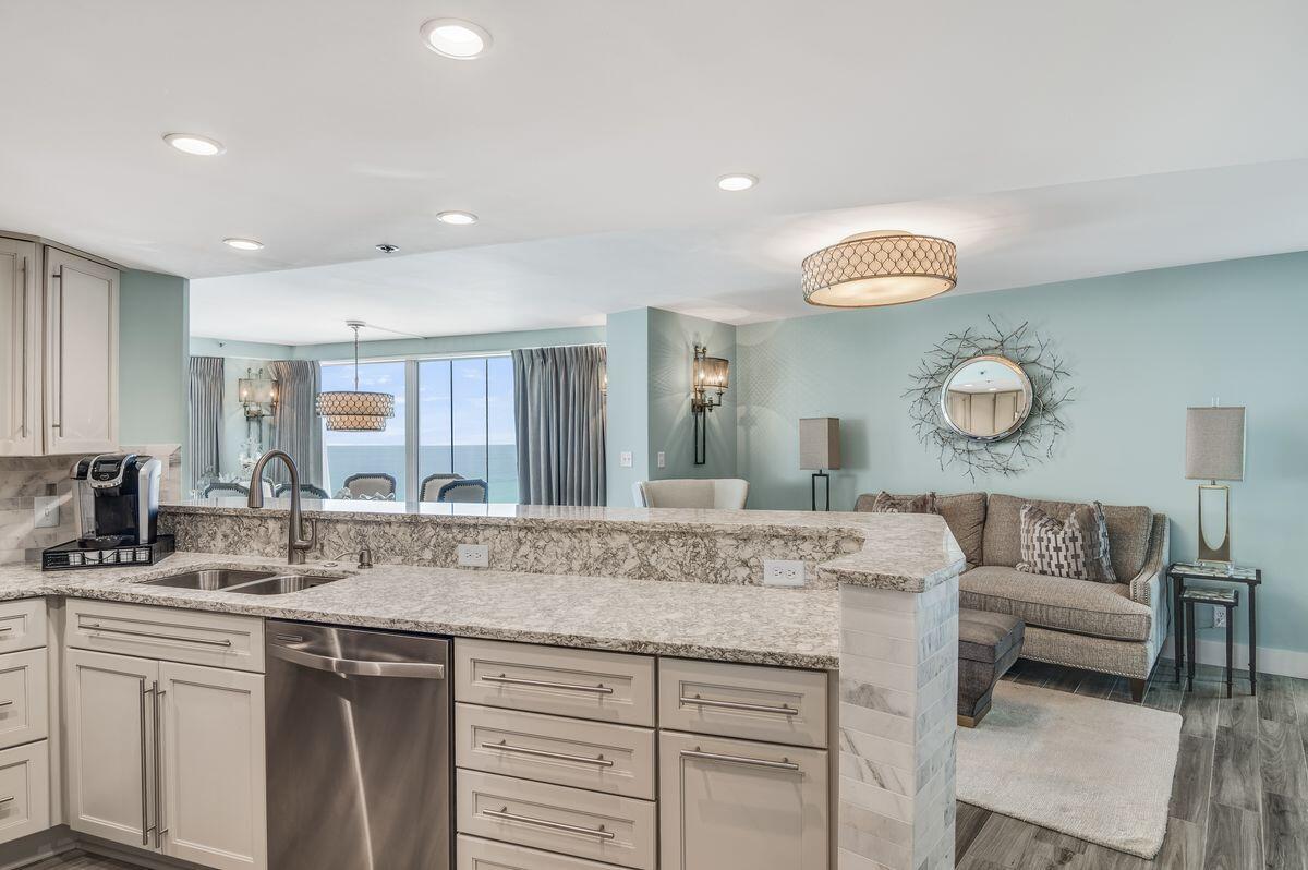 4323 Beachside 2, Unit 323 Miramar Beach, FL 32550 - Photo 16 of 41 a living room with granite countertop furniture and a sink