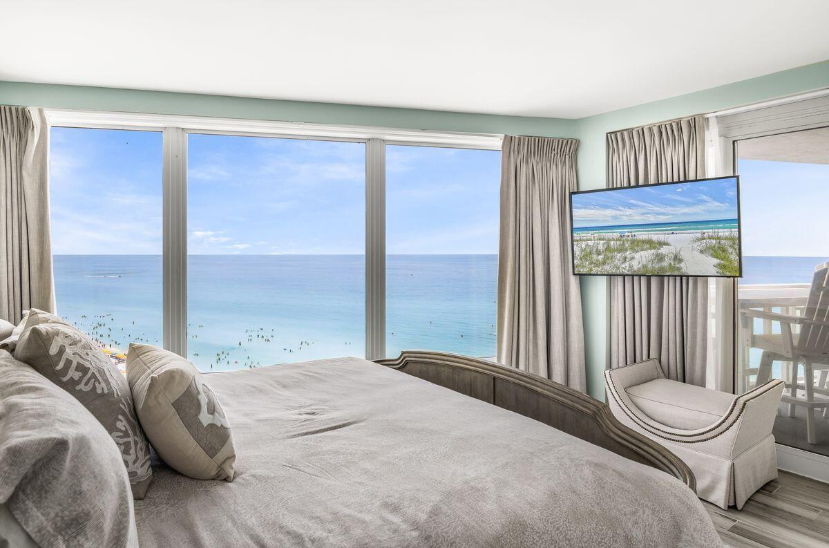 4323 Beachside 2, Unit 323 Miramar Beach, FL 32550 - Photo 17 of 41 a bedroom with a bed and a large window