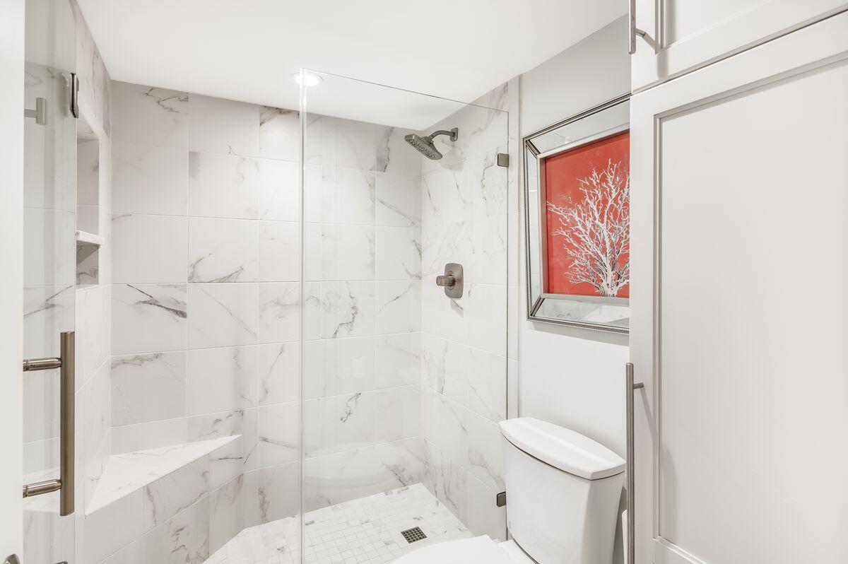 4323 Beachside 2, Unit 323 Miramar Beach, FL 32550 - Photo 26 of 41 a bathroom with a shower a toilet and a shower