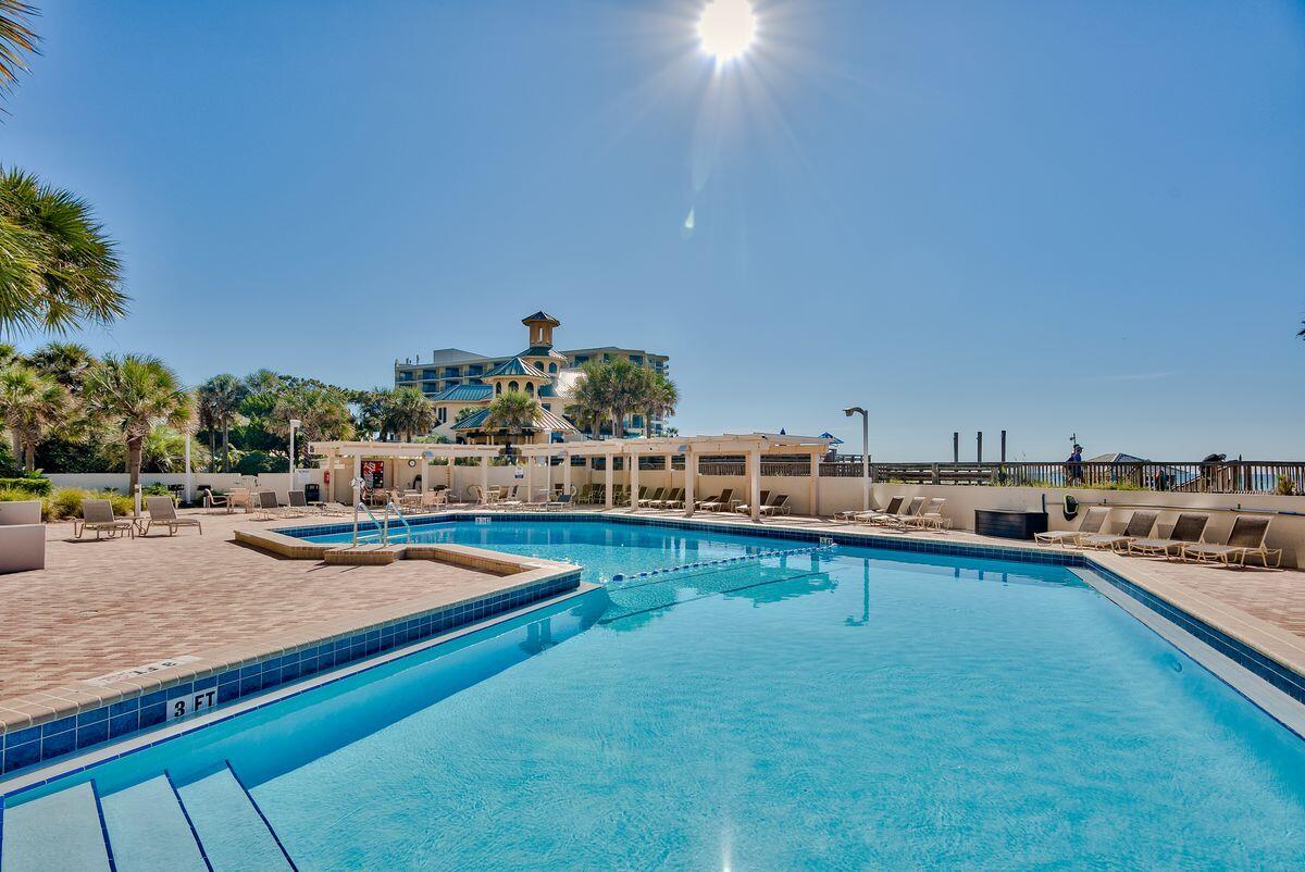 4323 Beachside 2, Unit 323 Miramar Beach, FL 32550 - Photo 29 of 41 a view of swimming pool with outdoor seating and yard