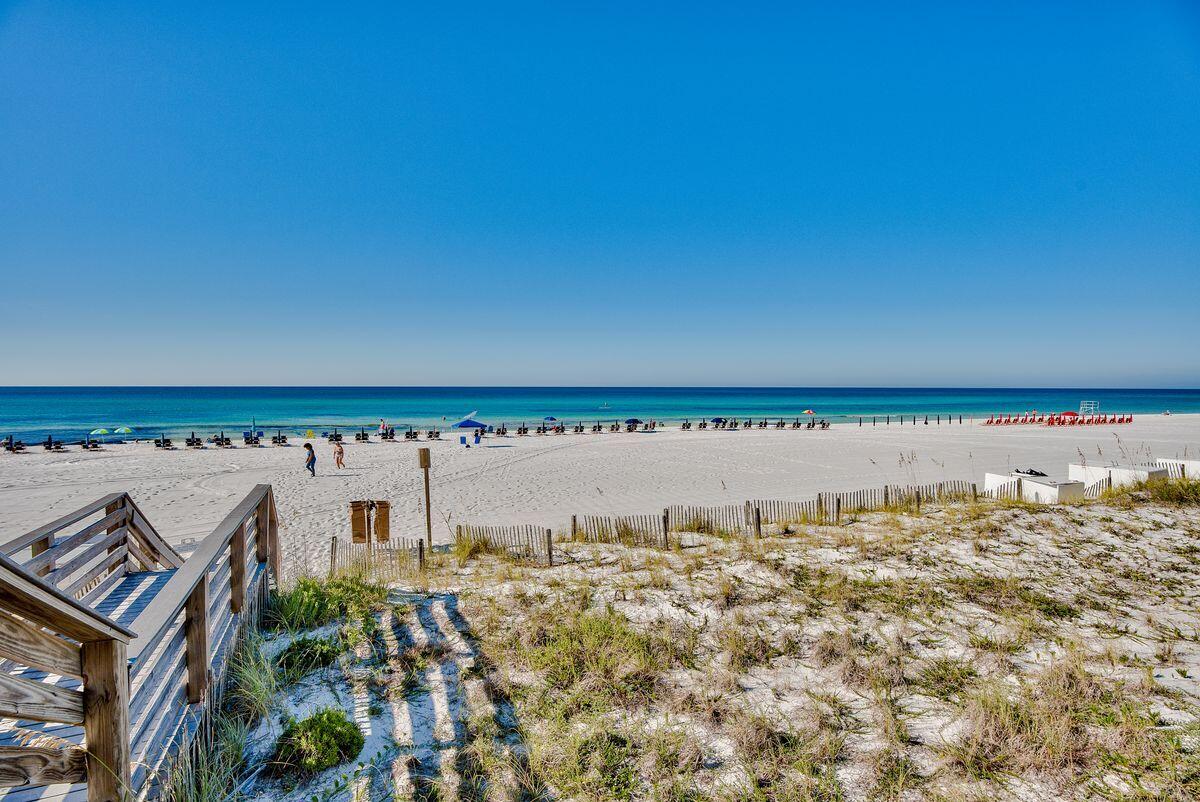 4323 Beachside 2, Unit 323 Miramar Beach, FL 32550 - Photo 32 of 41 a view of a large body of water with a building in the background