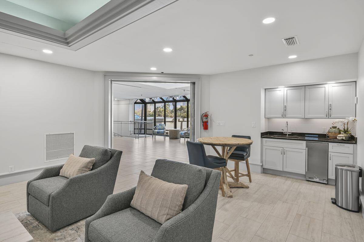 4323 Beachside 2, Unit 323 Miramar Beach, FL 32550 - Photo 37 of 41 a living room with furniture and kitchen view