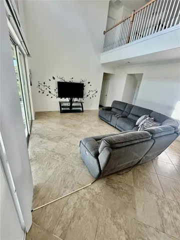a living room with furniture and a couch